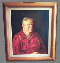  In 1967 the renowned artist Robert Roche encouraged Malcolm Locke to set for a portrait. The work which took a week to complete was done in oil on a wooden panel and aptly entitled The Trapper. This original and highly valued painting is still treasured in the private collection of Mr. Roche. The entire Locke family was very pleased with the portrait and had a photo of the painting made into Christmas cards for that year. Many trappers still have and treasure the cards sent out by Malcolm with individual notes to each recipient. 