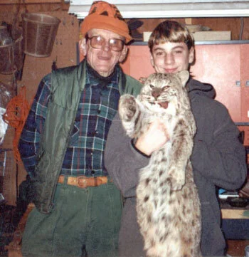  Jack and Grandson with a Bobcat. 