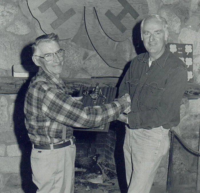  Octave Dulude (left) receiving the 1982 Trapper of The Year Award from NHTA President Bob Phoenix (right). 