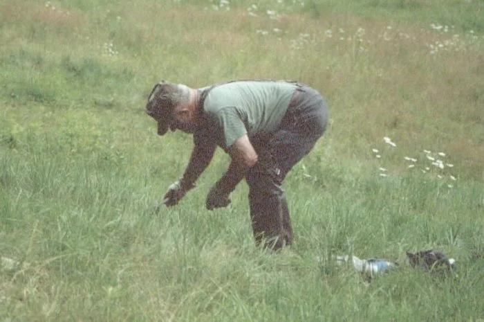 Ray creating a canine trap set.