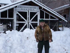  Harris standing in front of his Hand Carved Birds Showroom 03-14-05. 