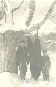  Very young Harris with older brother Allen and a neighbors bear. 