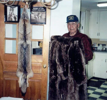  Harry Displays Beaver Coat Made for Wife With Fur Harvested From His Trapline. 